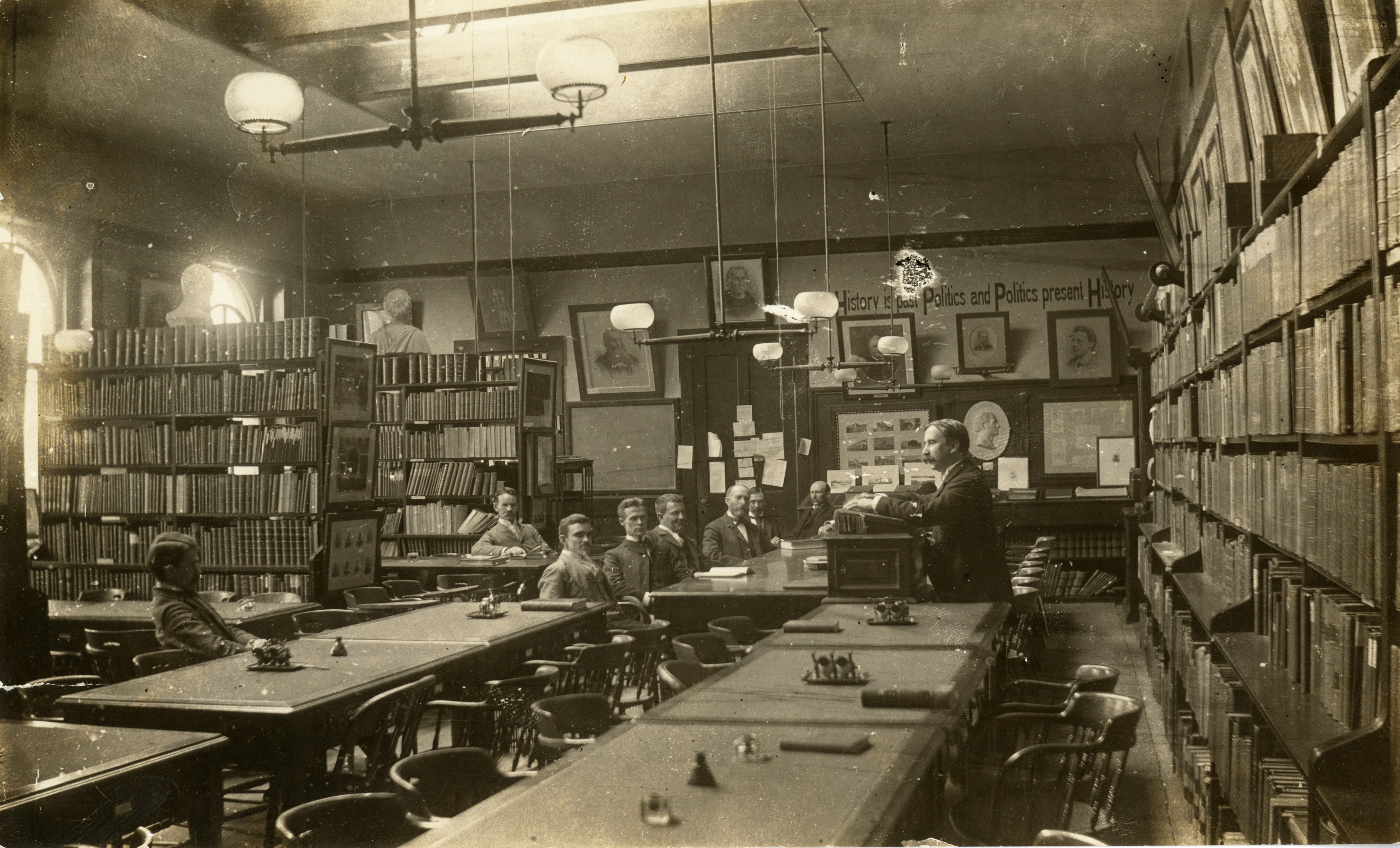 One of the first formal “seminars” in US academia. Herbert Baxter Adams, John Hopkins University’s first professor of history, speaking to students and faculty, ca. 1895. Courtesy if Special Collections, Sheridan Libraries, Johns Hopkins University. Public domain.